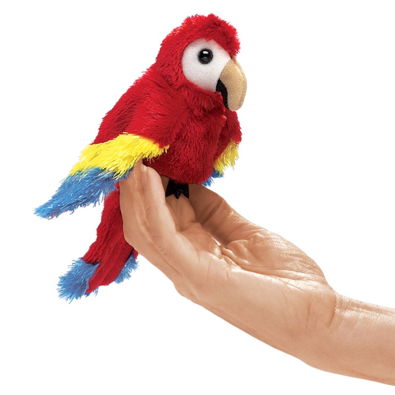 Folkmanis mini scarlet macaw finger puppet in red, yellow and blue sitting on a finger