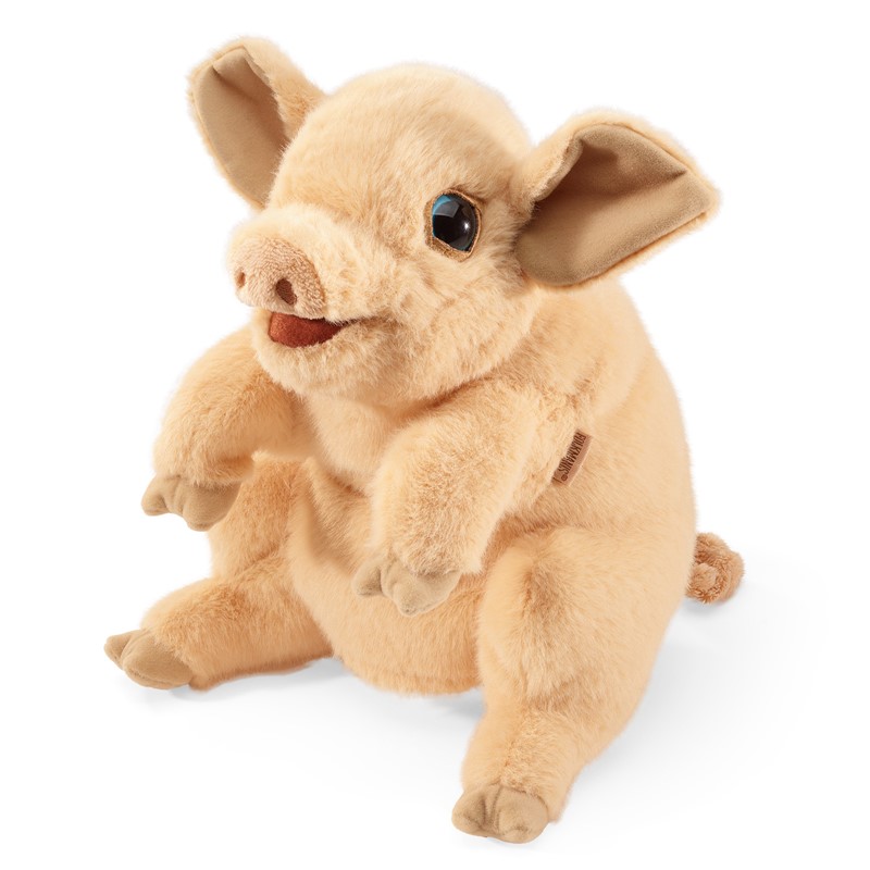 Folkmanis pig hand puppet in light beige, seated pose with movable mouth, side view