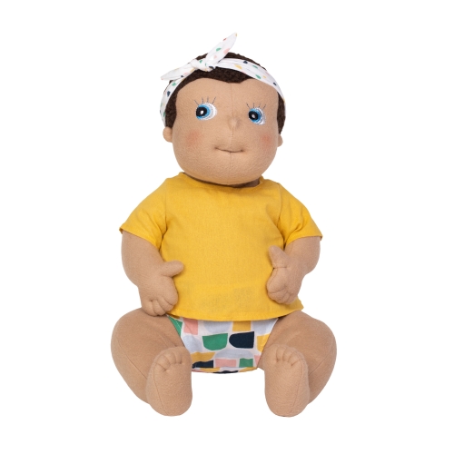 Rubens Barn baby doll Disa with dotted headband, yellow shirt and colourful nappy pants, sitting