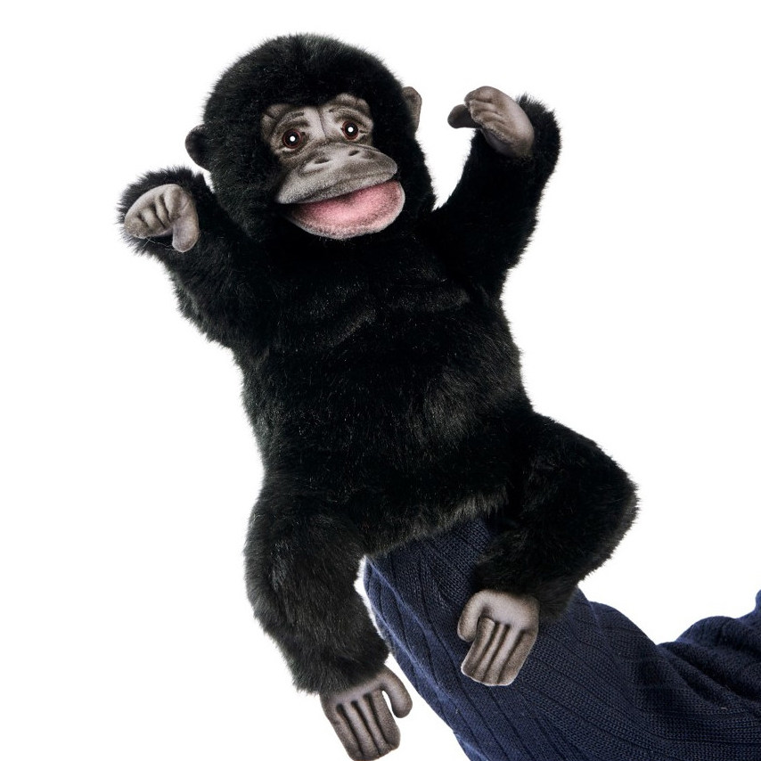 Gorilla hand puppet by Hansa Creation with black fur and an open pink mouth, arms raised
