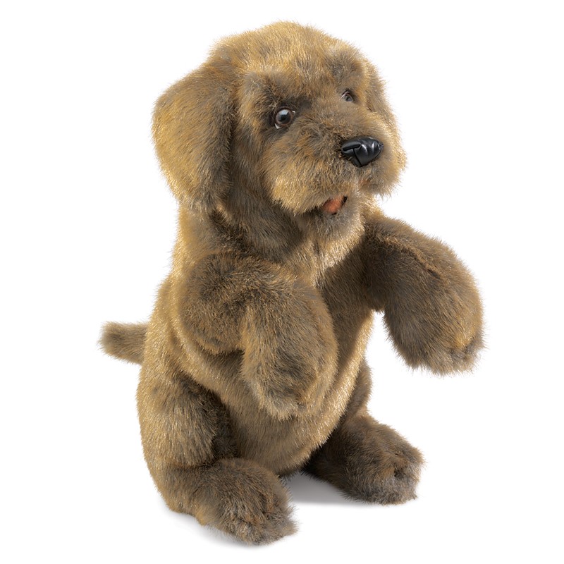 Folkmanis Sitting Dog hand puppet in brown fur, sitting upright with raised paw, front view