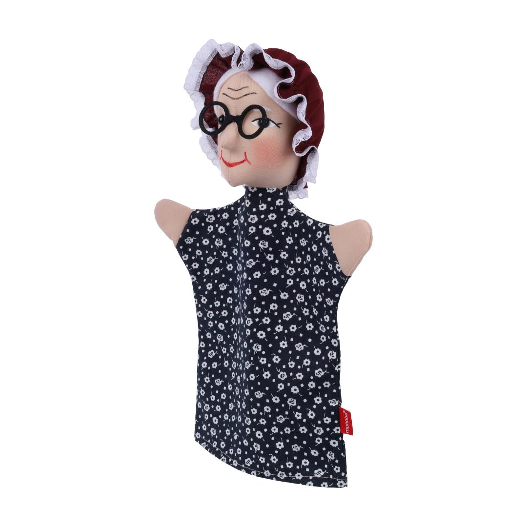 Grandmother hand puppet by munabo, turned to the side with a gentle smile and dark red bonnet.