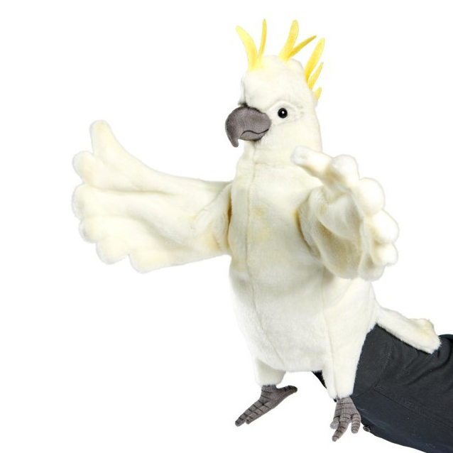 Cockatoo hand puppet by Hansa Creation with white plumage, a yellow crest and spread wings