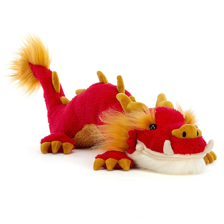 Jellycat plush toy Festival Dragon, red lying plush toy with golden spikes and a long tail, three-quarter view