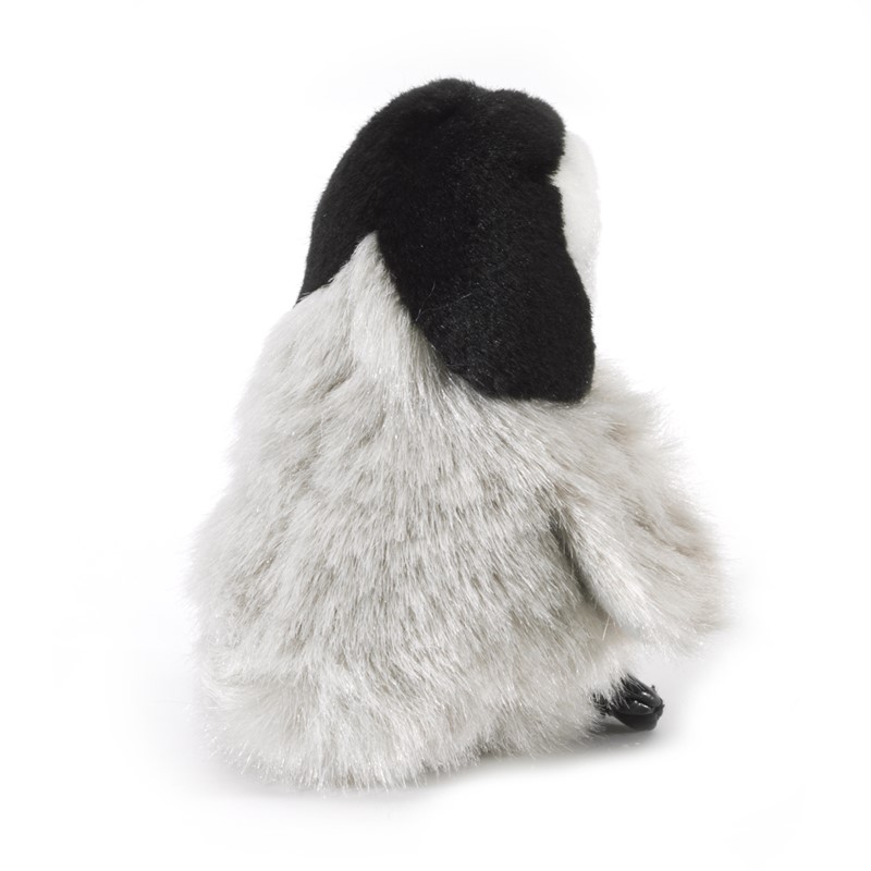 Folkmanis mini baby emperor penguin finger puppet in grey and black, rear view showing fluffy plumage