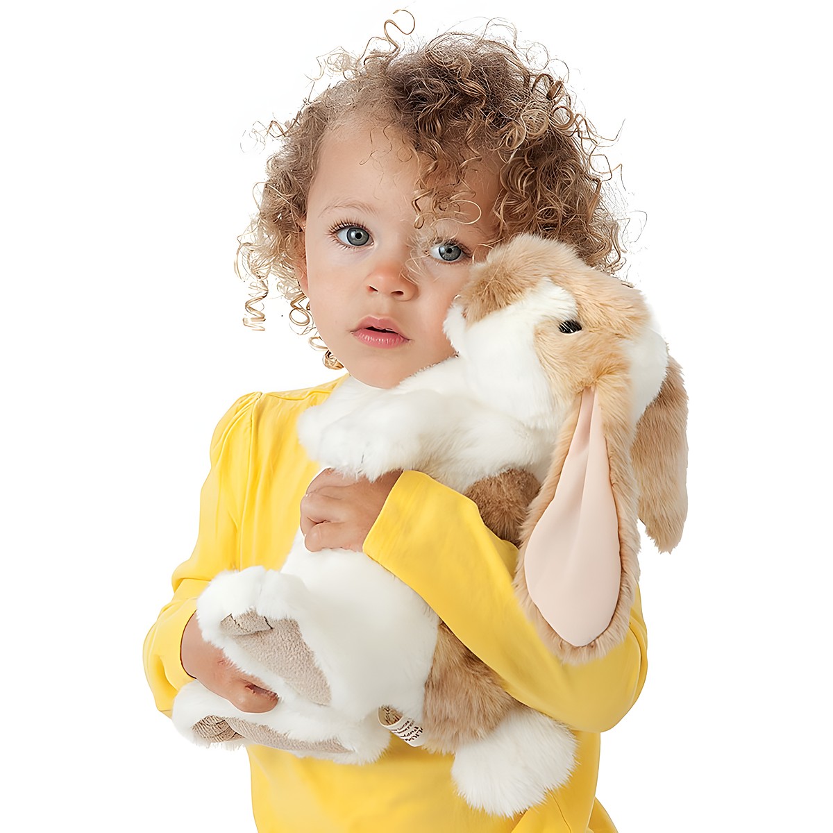 Small girl holding the Folkmanis standing lop rabbit hand puppet with beige-and-white fur and long floppy ears in her arms