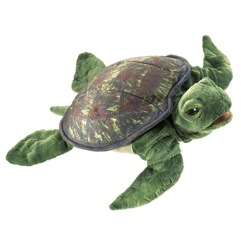 Folkmanis sea turtle hand puppet with green plush body, patterned shell and slightly open mouth, angled view